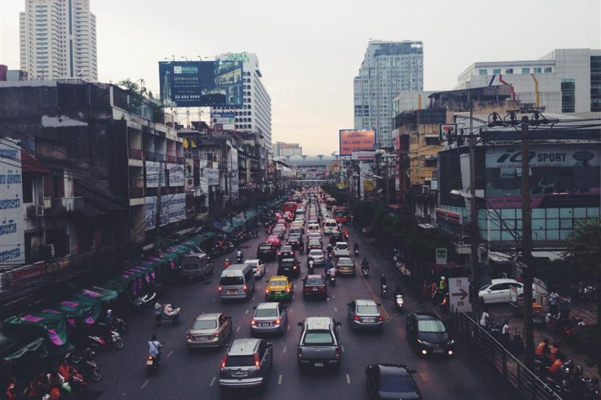 Busy city road packed with traffic, seen from above